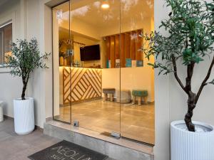 TV a/nebo společenská místnost v ubytování Aeolia suites