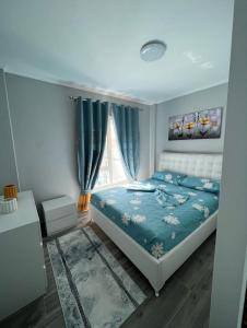 Postel nebo postele na pokoji v ubytování Apartaments