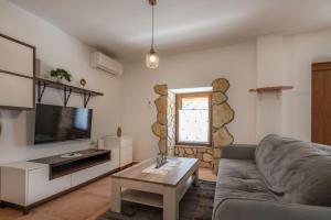 Μια τηλεόραση ή/και κέντρο ψυχαγωγίας στο Villa Biba, a seaside hideaway with a pool