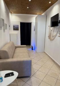 Televisyen dan/atau pusat hiburan di DomusSolis - Casa vacanza a 2 passi dal mare