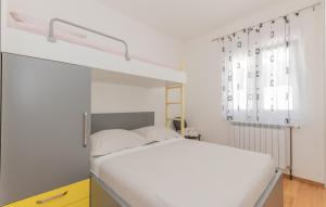 Ένα ή περισσότερα κρεβάτια σε δωμάτιο στο Villa Rusula -Makarska by Villas Guide +23 φωτογραφίες