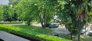 a view of a parking lot with a car parked at Villa I Cigni Holidays Home in Arona