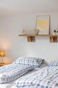 Ένα ή περισσότερα κρεβάτια σε δωμάτιο στο Bed & Breakfast de Lindevallei