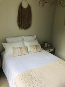 Postel nebo postele na pokoji v ubytování LE COCOONING 50 m de la plage en baie de somme + 7 fotografií