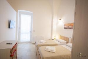 Postel nebo postele na pokoji v ubytování RC Apartment