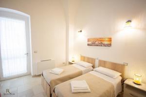Postel nebo postele na pokoji v ubytování RC Apartment