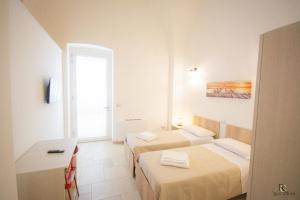 Postel nebo postele na pokoji v ubytování RC Apartment