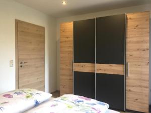 Postel nebo postele na pokoji v ubytování FW Rettenberger