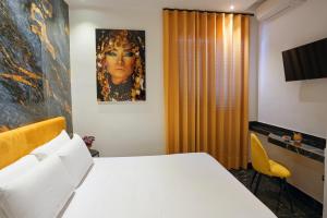 Posteľ alebo postele v izbe v ubytovaní Albergo Pompei Valley