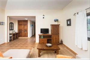TV a/nebo společenská místnost v ubytování Casa LA VERA