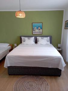 Posteľ alebo postele v izbe v ubytovaní Apartman sunny green