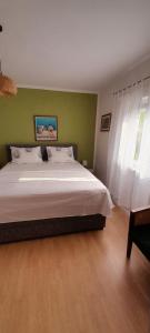 Posteľ alebo postele v izbe v ubytovaní Apartman sunny green