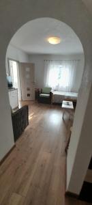 Televízia a/alebo spoločenská miestnosť v ubytovaní Apartman sunny green
