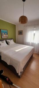Posteľ alebo postele v izbe v ubytovaní Apartman sunny green