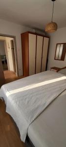 Posteľ alebo postele v izbe v ubytovaní Apartman sunny green