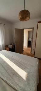 Posteľ alebo postele v izbe v ubytovaní Apartman sunny green