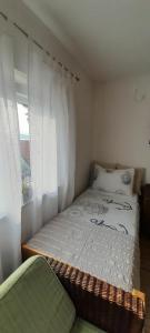 Posteľ alebo postele v izbe v ubytovaní Apartman sunny green