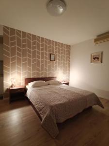 Ein Bett oder Betten in einem Zimmer der Unterkunft Apartments Miljas