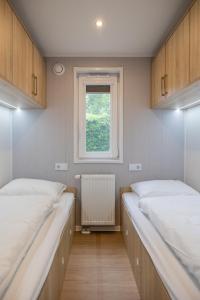 Postel nebo postele na pokoji v ubytování Chalet Unique