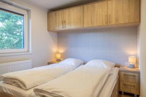 Postel nebo postele na pokoji v ubytování Chalet Unique