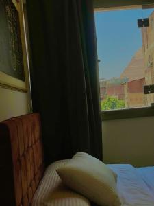 Postel nebo postele na pokoji v ubytování The View Pyramids Hotel + 37 fotografií