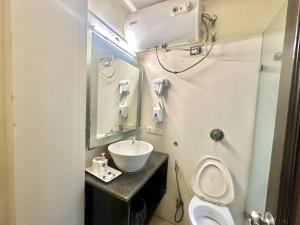 Koupelna v ubytování Hotel Grand Arcasia Saket- Near PVR Anupam