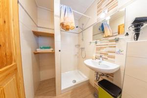 Koupelna v ubytování Rooms&Apartments Pazlar + 22 fotografií