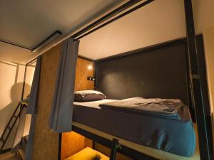 Ein Bett oder Betten in einem Zimmer der Unterkunft TIMN Hostel Female Only