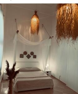 Llit o llits en una habitació de Borgo Rosalia