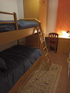 En eller flere senge i et værelse på Apartamento con vistas al mar