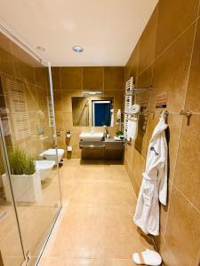 Kúpeľňa v ubytovaní Jasna SportHotel & SPA