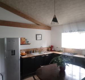 Kuchyň nebo kuchyňský kout v ubytování Gîte L'horizon
