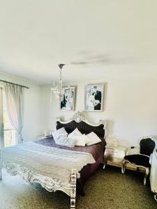 Ένα ή περισσότερα κρεβάτια σε δωμάτιο στο Villa Wayra