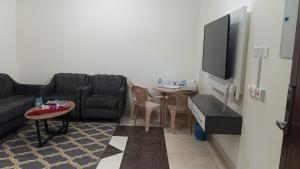 Televisyen dan/atau pusat hiburan di Beauty Rose ApartHotel