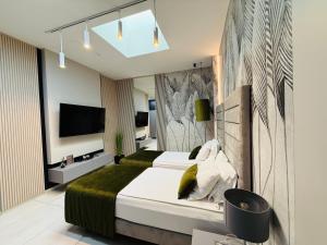 Posteľ alebo postele v izbe v ubytovaní Jasna SportHotel & SPA
