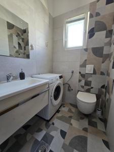 Kúpeľňa v ubytovaní Family apartments Grguric