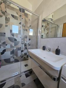 Kúpeľňa v ubytovaní Family apartments Grguric