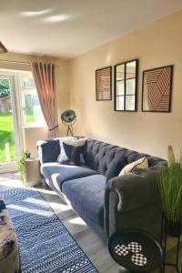 O zonă de relaxare la Lovely 5 bedroom House with Parking in Aylesbury