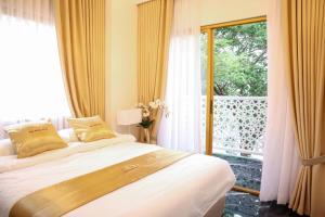 Postel nebo postele na pokoji v ubytování The Royal Clb Hotel and Resorts + 110 fotografií