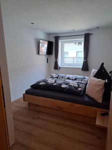 Postel nebo postele na pokoji v ubytování Appartement Reichholf