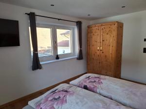 Postel nebo postele na pokoji v ubytování Appartement Reichholf
