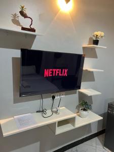 TV a/nebo společenská místnost v ubytování Studio6