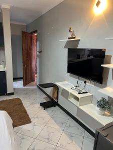TV a/nebo společenská místnost v ubytování Studio6