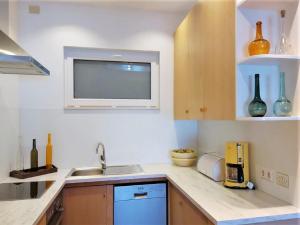 A kitchen or kitchenette at Belvilla by OYO PAN03 3 - Residenza Panorama