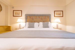 Кровать или кровати в номере Relais Villa San Martino