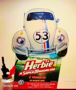 a poster for a movie with a car on it at Home Art & Design in Trieste