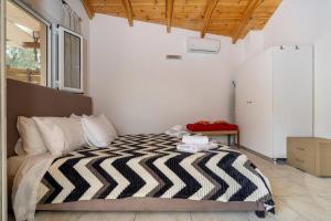 Ένα ή περισσότερα κρεβάτια σε δωμάτιο στο Vadina Apartment 2