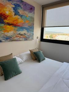Hotel Playa de la Plata客房内的一张或多张床位