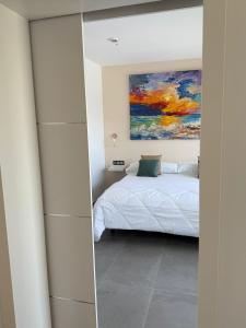 Hotel Playa de la Plata客房内的一张或多张床位