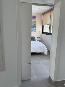 Hotel Playa de la Plata客房内的一张或多张床位